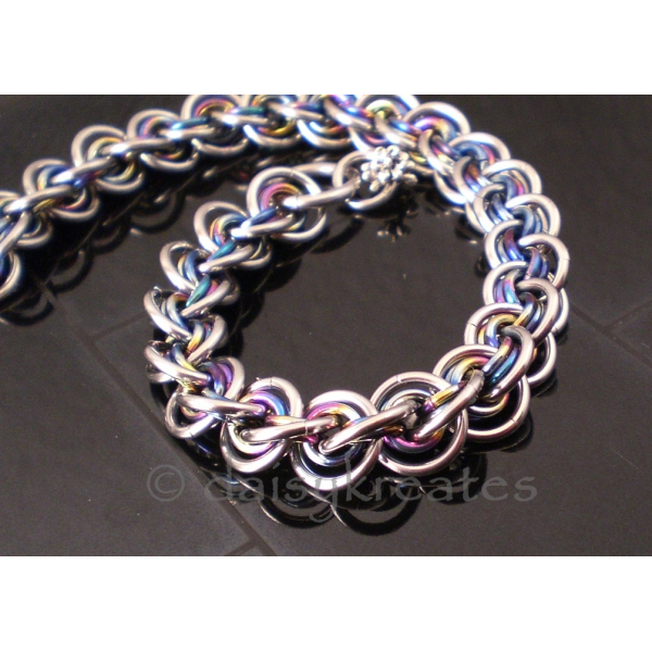 3x3 Wave Bracelet in stainless steel and rainbow anodized niobium