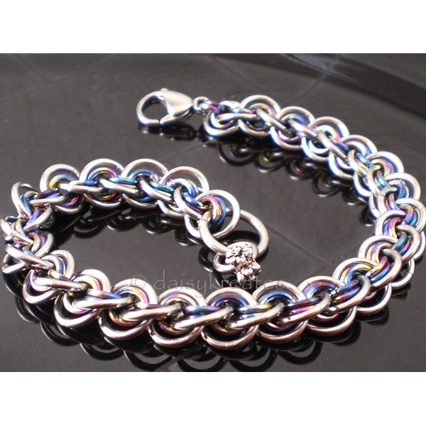 3x3 Wave Bracelet in stainless steel and rainbow anodized niobium