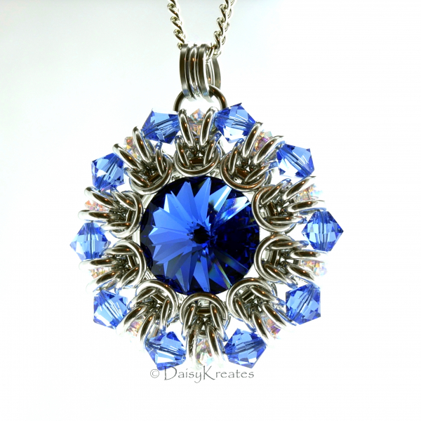 Sunburst medallion pendant with blue Swarovski rivoli and crystals beads
