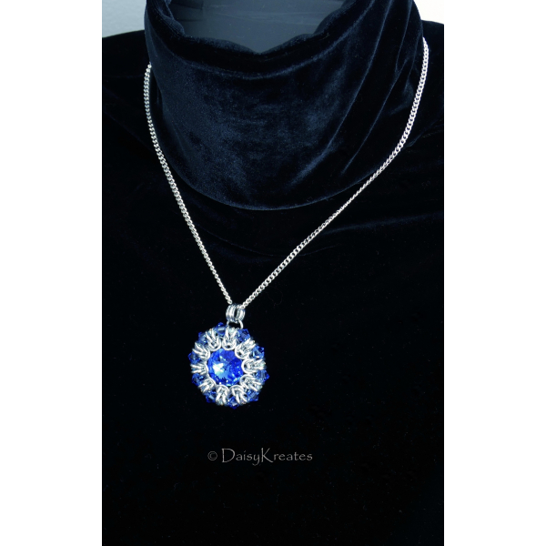 Sunburst medallion pendant with blue Swarovski rivoli and crystals beads