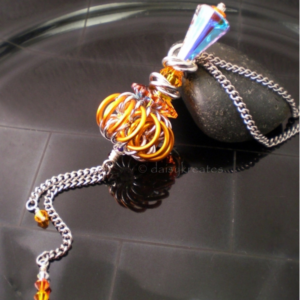 Genie Bottle Necklace with Orange Chainmaille Whirlybird Pendant