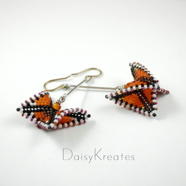 Beaded Monarch butterfly earrings in 3D geometric style
