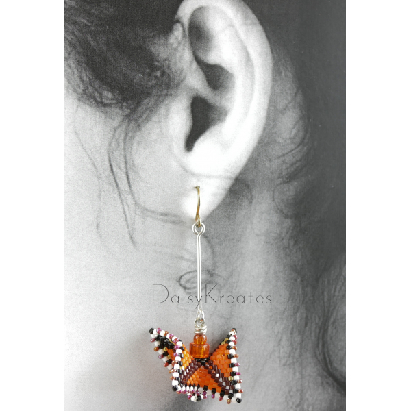 Each Monarch butterfly earring can swivel for front or back side view