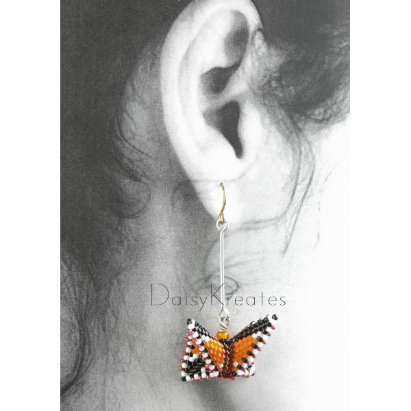 Each Monarch butterfly earring can swivel for front or back side view