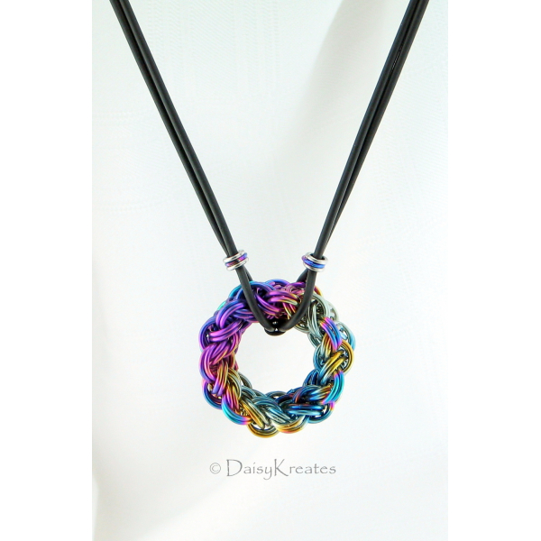 Circular chainmaille pendant in kinged/doubled Vipera Berus weave