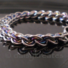 3x3 Wave Bracelet in stainless steel and rainbow anodized niobium