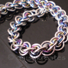 3x3 Wave Bracelet in stainless steel and rainbow anodized niobium