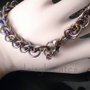 3x3 Wave Bracelet in stainless steel and rainbow anodized niobium