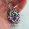 Chainmaille Mandala Pendant's colors reminiscent of Tibetan sand mandala