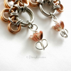 Bronze foiled glass tulip beads dots the end of each earrings, adds movements Bronze foiled glass tulip beads dots the end of each earrings, adds movements