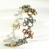 Annie's Petite Paw Prints Bracelet in Mixed Metals with Heart Clasp