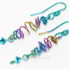 Freehand forming of the earrings ensures the organic look and feel of the sprite