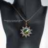 Byzantine Sun pendant pairs well with stainless steel snake chain