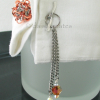 Unique design of cufflink with tassels offers feminine flair