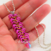 Hot pink anodized aluminum rings perfectly matched with the pink drop bead