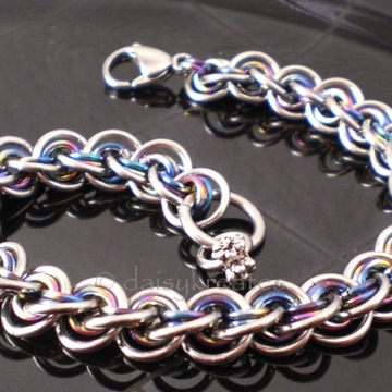 3x3 Wave Bracelet in stainless steel and rainbow anodized niobium