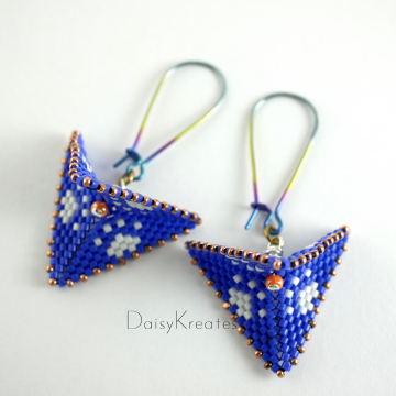 Blue white color pattern is accented with copper orange beads, rainbow earwires