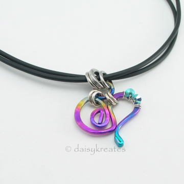 Multi-Color Forged Heart Pendant on Double-Strand Rubber Tube Necklace Multi-Color Forged Heart Pendant on Double-Strand Rubber Tube Necklace