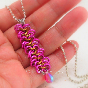 Hot pink anodized aluminum rings perfectly matched with the pink drop bead